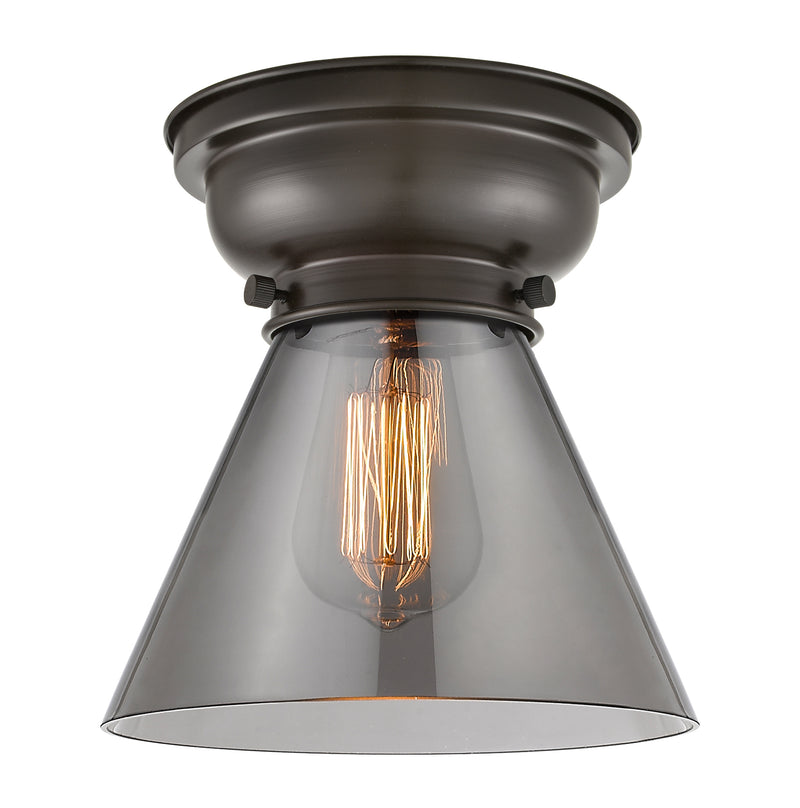Cone Flush Mount shown in the Oil Rubbed Bronze finish with a Plated Smoke shade
