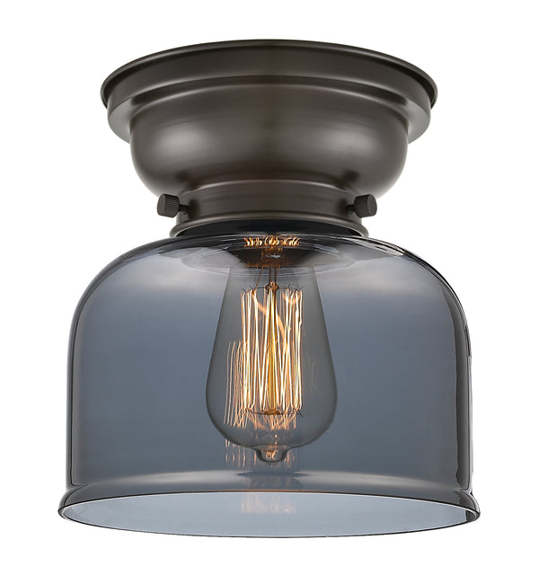Bell Flush Mount shown in the Oil Rubbed Bronze finish with a Plated Smoke shade
