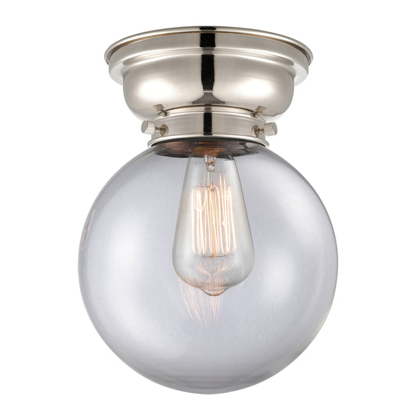 Beacon Flush Mount shown in the Polished Nickel finish with a Clear shade
