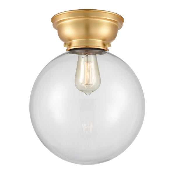 Beacon Flush Mount shown in the Satin Gold finish with a Clear shade