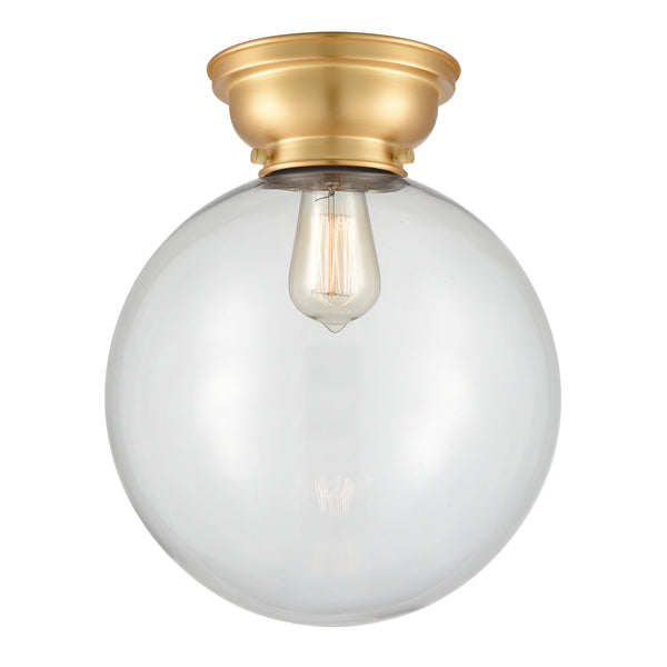 Beacon Flush Mount shown in the Satin Gold finish with a Clear shade
