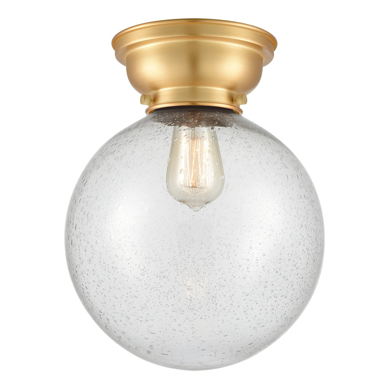 Beacon Flush Mount shown in the Satin Gold finish with a Seedy shade