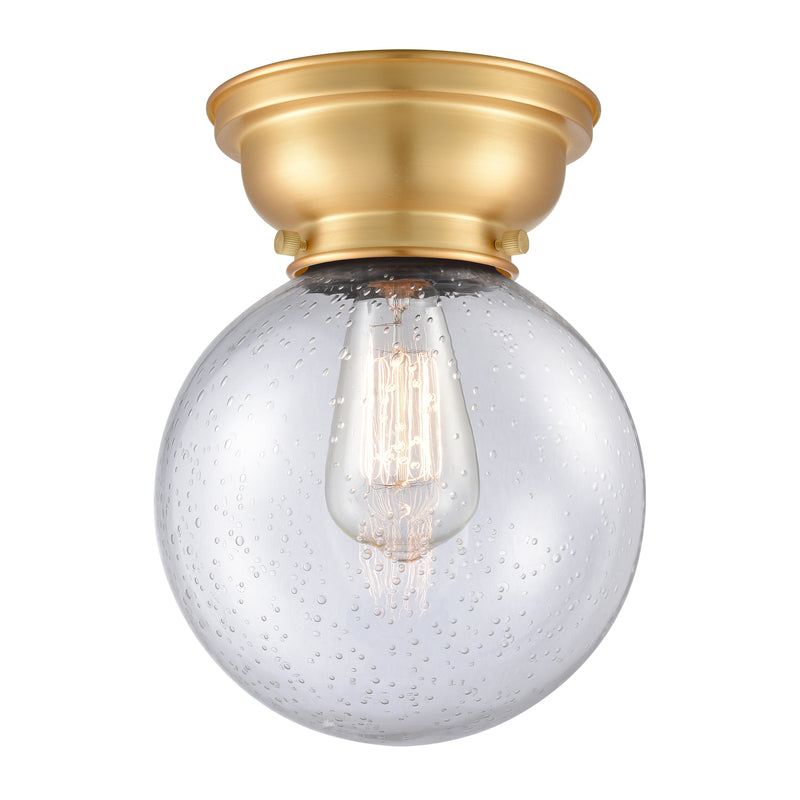 Beacon Flush Mount shown in the Satin Gold finish with a Seedy shade