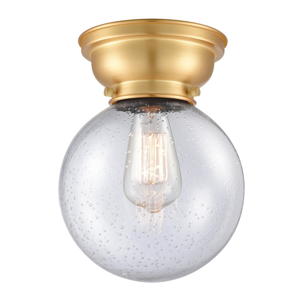 Beacon Flush Mount shown in the Satin Gold finish with a Seedy shade