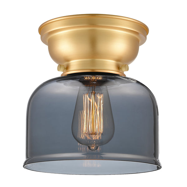 Bell Flush Mount shown in the Satin Gold finish with a Plated Smoke shade