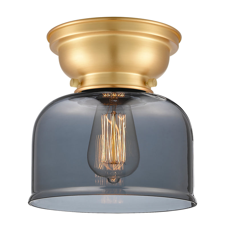 Bell Flush Mount shown in the Satin Gold finish with a Plated Smoke shade