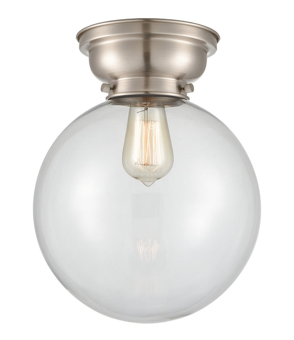 Beacon Flush Mount shown in the Brushed Satin Nickel finish with a Clear shade