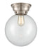 Beacon Flush Mount shown in the Brushed Satin Nickel finish with a Clear shade