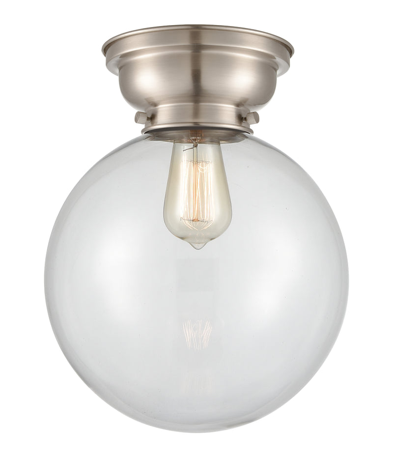 Beacon Flush Mount shown in the Brushed Satin Nickel finish with a Clear shade