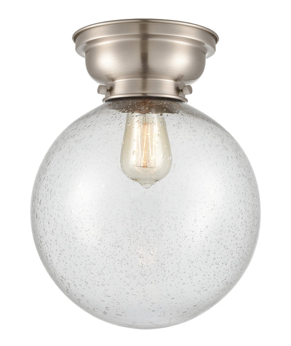 Beacon Flush Mount shown in the Brushed Satin Nickel finish with a Seedy shade