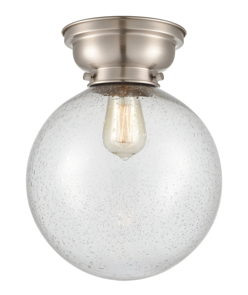 Beacon Flush Mount shown in the Brushed Satin Nickel finish with a Seedy shade