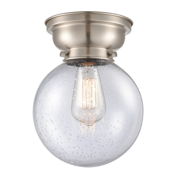 Beacon Flush Mount shown in the Brushed Satin Nickel finish with a Seedy shade