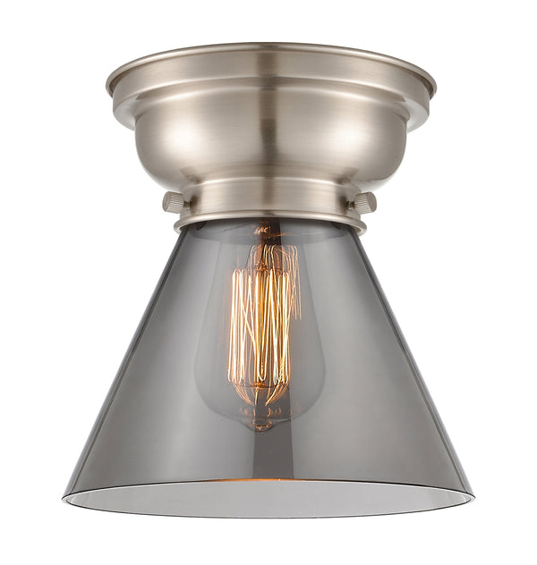 Cone Flush Mount shown in the Brushed Satin Nickel finish with a Plated Smoke shade