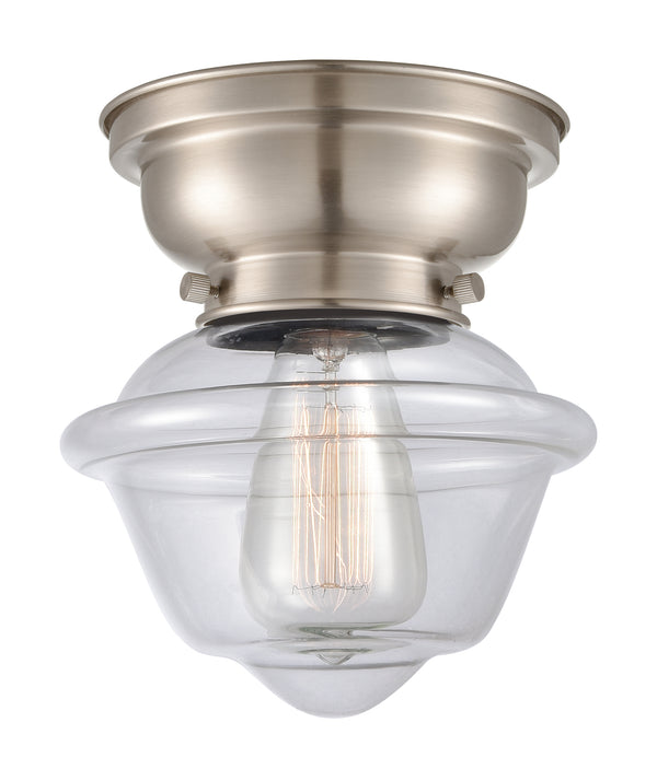 Oxford Flush Mount shown in the Brushed Satin Nickel finish with a Clear shade