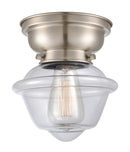 Oxford Flush Mount shown in the Brushed Satin Nickel finish with a Clear shade