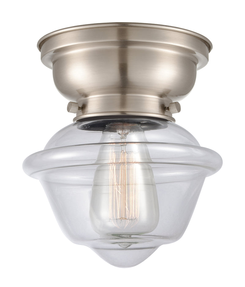 Oxford Flush Mount shown in the Brushed Satin Nickel finish with a Clear shade