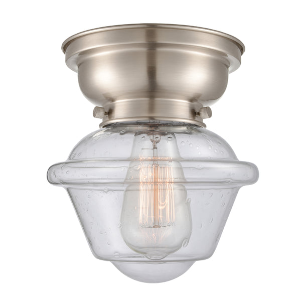 Oxford Flush Mount shown in the Brushed Satin Nickel finish with a Seedy shade