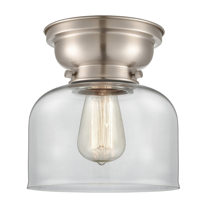 Bell Flush Mount shown in the Brushed Satin Nickel finish with a Clear shade