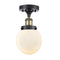 Beacon Semi-Flush Mount shown in the Black Antique Brass finish with a Matte White shade