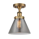 Cone Semi-Flush Mount shown in the Brushed Brass finish with a Plated Smoke shade