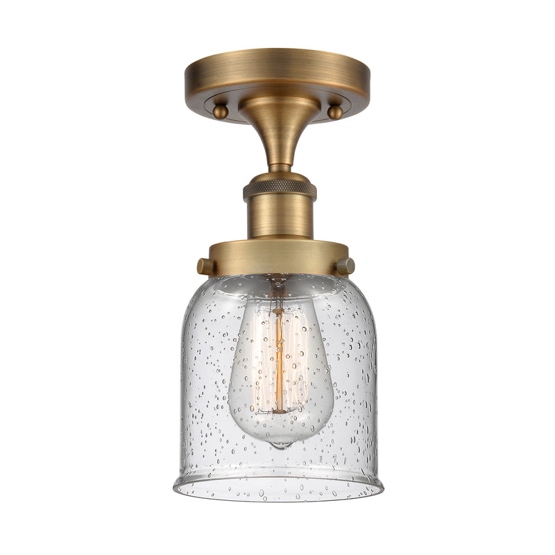 Bell Semi-Flush Mount shown in the Brushed Brass finish with a Seedy shade