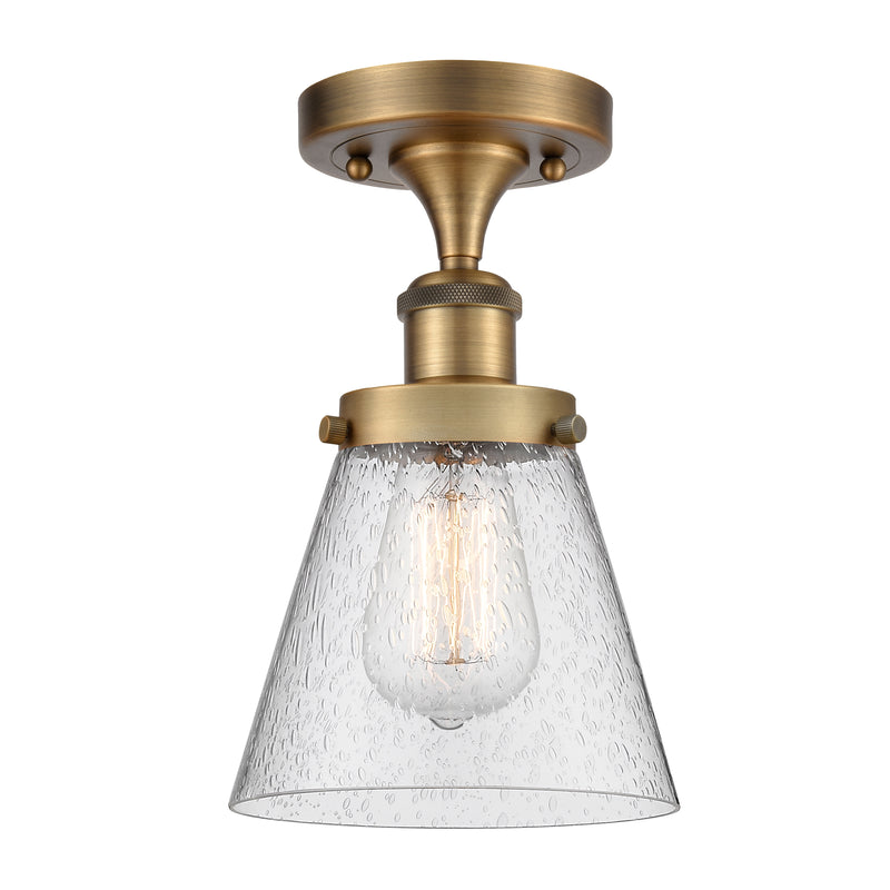 Cone Semi-Flush Mount shown in the Brushed Brass finish with a Seedy shade