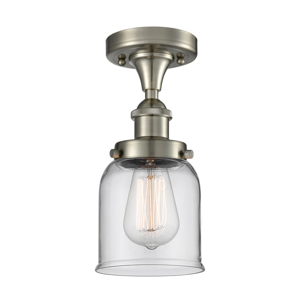 Bell Flush Mount shown in the Brushed Satin Nickel finish with a Clear shade