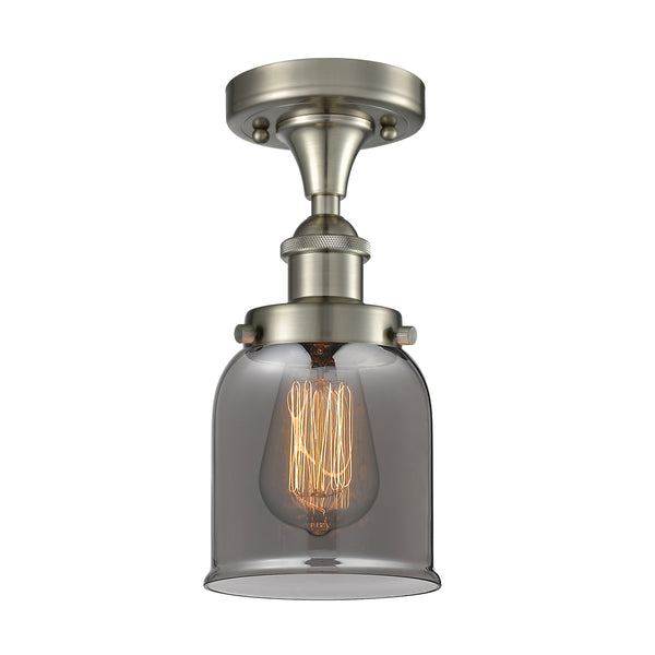 Bell Flush Mount shown in the Brushed Satin Nickel finish with a Plated Smoke shade