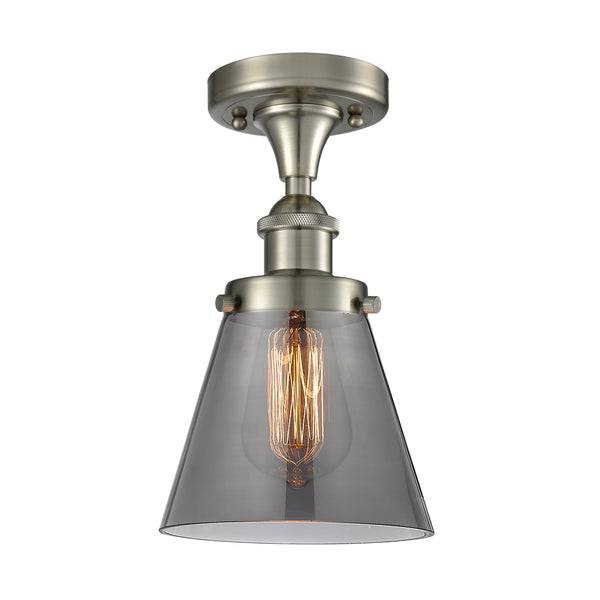 Cone Flush Mount shown in the Brushed Satin Nickel finish with a Plated Smoke shade
