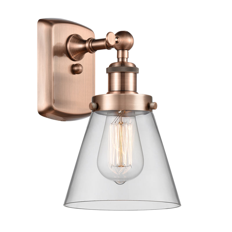 Cone Sconce shown in the Antique Copper finish with a Clear shade