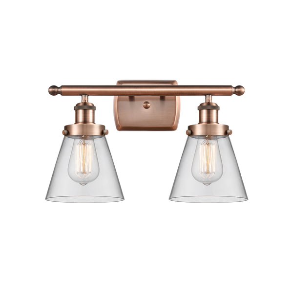 Cone Bath Vanity Light shown in the Antique Copper finish with a Clear shade