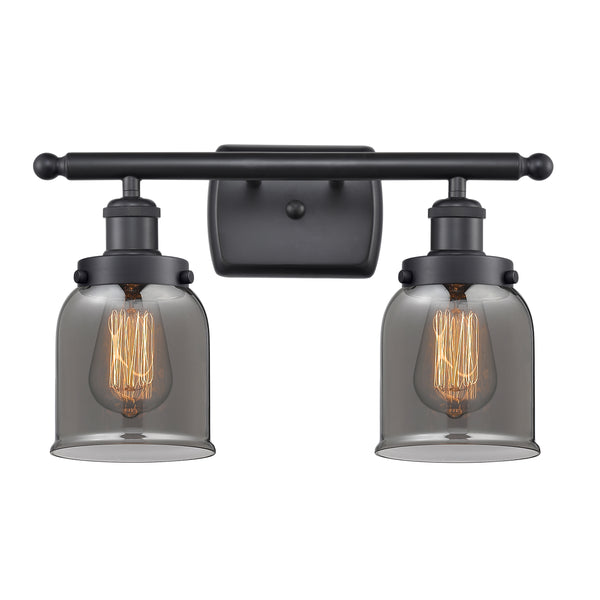 Bell Bath Vanity Light shown in the Matte Black finish with a Plated Smoke shade