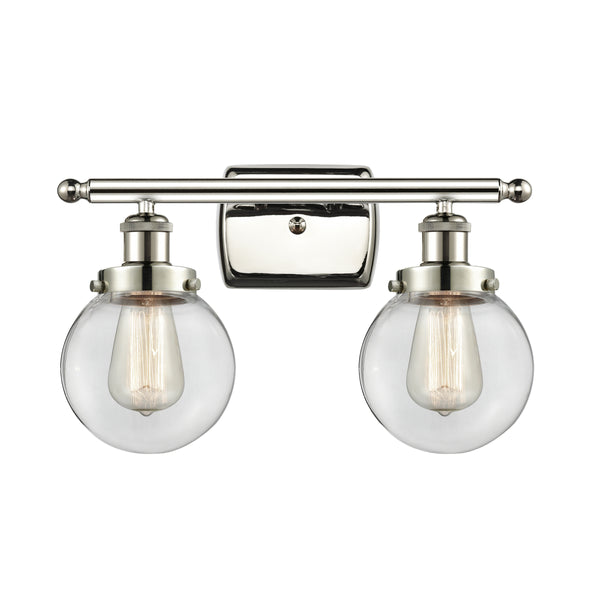Beacon Bath Vanity Light shown in the Polished Nickel finish with a Clear shade