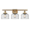Bell Bath Vanity Light shown in the Brushed Brass finish with a Seedy shade