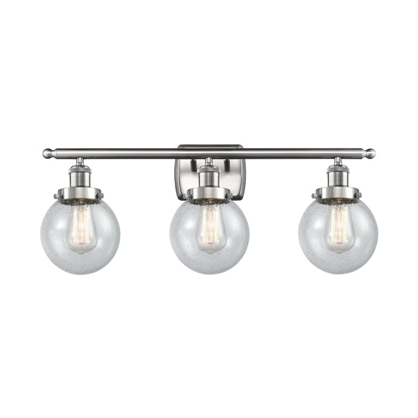 Beacon Bath Vanity Light shown in the Brushed Satin Nickel finish with a Seedy shade