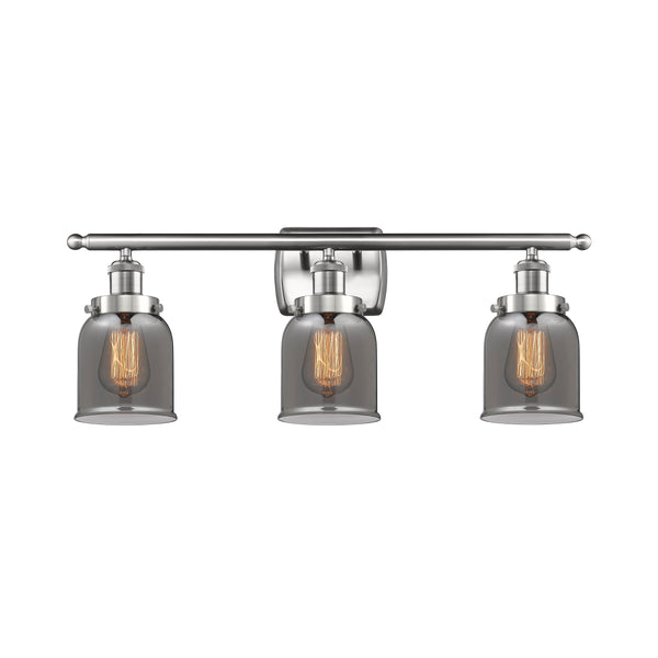 Bell Bath Vanity Light shown in the Brushed Satin Nickel finish with a Plated Smoke shade