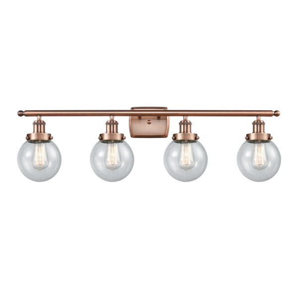 Beacon Bath Vanity Light shown in the Antique Copper finish with a Seedy shade