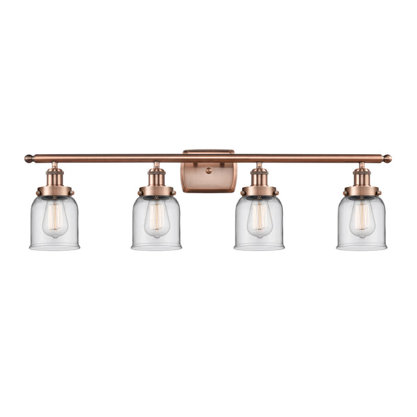 Bell Bath Vanity Light shown in the Antique Copper finish with a Clear shade