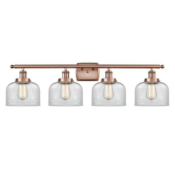 Bell Bath Vanity Light shown in the Antique Copper finish with a Clear shade
