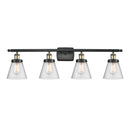 Cone Bath Vanity Light shown in the Black Antique Brass finish with a Seedy shade