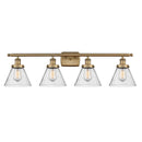 Cone Bath Vanity Light shown in the Brushed Brass finish with a Seedy shade