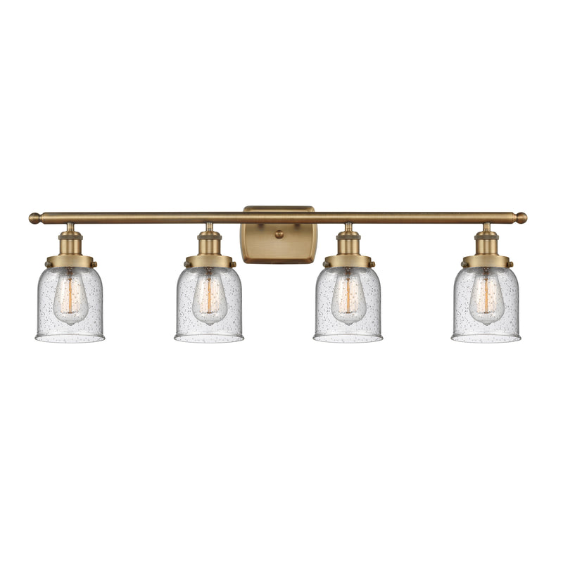 Bell Bath Vanity Light shown in the Brushed Brass finish with a Seedy shade
